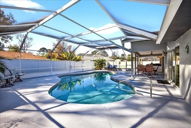 Refined Florida living awaits in this beautifully maintained on The Grand Club - Pine Lakes Course in Florida - for sale on GolfHomes.com, golf home, golf lot