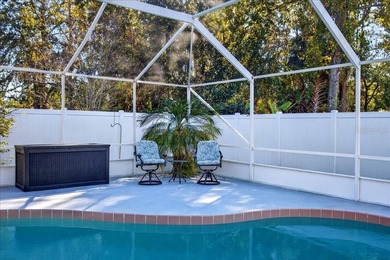 Refined Florida living awaits in this beautifully maintained on The Grand Club - Pine Lakes Course in Florida - for sale on GolfHomes.com, golf home, golf lot