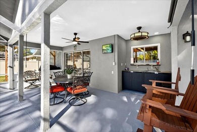 Refined Florida living awaits in this beautifully maintained on The Grand Club - Pine Lakes Course in Florida - for sale on GolfHomes.com, golf home, golf lot