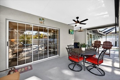 Refined Florida living awaits in this beautifully maintained on The Grand Club - Pine Lakes Course in Florida - for sale on GolfHomes.com, golf home, golf lot