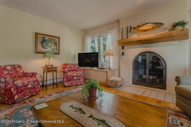 Discover the ease of single-floor living in this delightful on Ranch at Roaring Fork Golf Course in Colorado - for sale on GolfHomes.com, golf home, golf lot