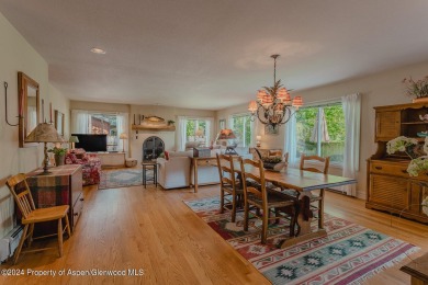 Discover the ease of single-floor living in this delightful on Ranch at Roaring Fork Golf Course in Colorado - for sale on GolfHomes.com, golf home, golf lot