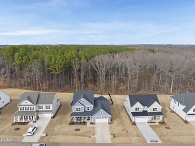 Welcome home to 125 Vast View Way, a beautifully designed on Olde Liberty Golf and Country Club in North Carolina - for sale on GolfHomes.com, golf home, golf lot
