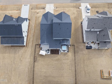 Welcome home to 125 Vast View Way, a beautifully designed on Olde Liberty Golf and Country Club in North Carolina - for sale on GolfHomes.com, golf home, golf lot