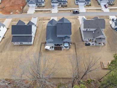 Welcome home to 125 Vast View Way, a beautifully designed on Olde Liberty Golf and Country Club in North Carolina - for sale on GolfHomes.com, golf home, golf lot