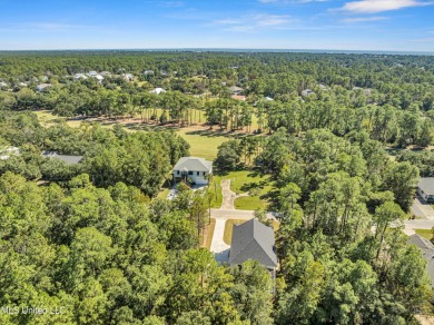 This beautiful new construction is a quick golf cart ride to all on Pass Christian Isles Golf Club in Mississippi - for sale on GolfHomes.com, golf home, golf lot