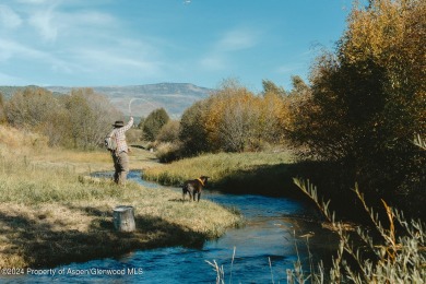 Discover the ease of single-floor living in this delightful on Ranch at Roaring Fork Golf Course in Colorado - for sale on GolfHomes.com, golf home, golf lot