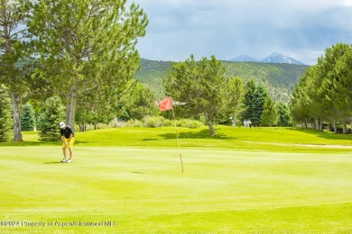 Discover the ease of single-floor living in this delightful on Ranch at Roaring Fork Golf Course in Colorado - for sale on GolfHomes.com, golf home, golf lot