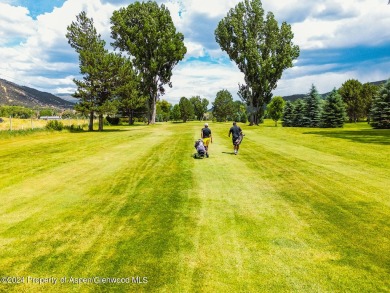 Discover the ease of single-floor living in this delightful on Ranch at Roaring Fork Golf Course in Colorado - for sale on GolfHomes.com, golf home, golf lot