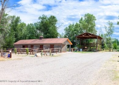 Discover the ease of single-floor living in this delightful on Ranch at Roaring Fork Golf Course in Colorado - for sale on GolfHomes.com, golf home, golf lot