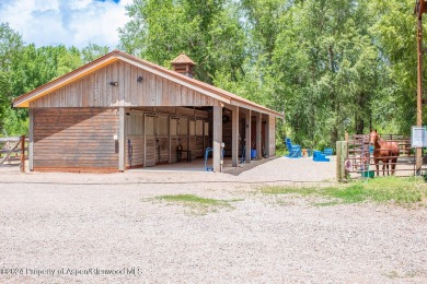 Discover the ease of single-floor living in this delightful on Ranch at Roaring Fork Golf Course in Colorado - for sale on GolfHomes.com, golf home, golf lot