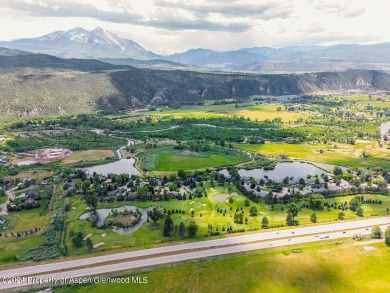 Discover the ease of single-floor living in this delightful on Ranch at Roaring Fork Golf Course in Colorado - for sale on GolfHomes.com, golf home, golf lot