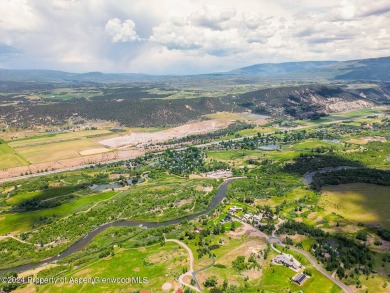 Discover the ease of single-floor living in this delightful on Ranch at Roaring Fork Golf Course in Colorado - for sale on GolfHomes.com, golf home, golf lot