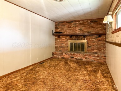 Welcome to your dream home at 1705 Takewell! This charming on Phillips Country Club in Texas - for sale on GolfHomes.com, golf home, golf lot