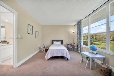 Welcome to Residence 202 at Oaks Lane. You'll feel lighter than on Palm-Aire Country Club and Resort - Palms in Florida - for sale on GolfHomes.com, golf home, golf lot