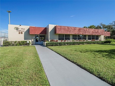 This turnkey 2 bedroom/2 bath condo has impact windows except on The American Golf Club in Florida - for sale on GolfHomes.com, golf home, golf lot