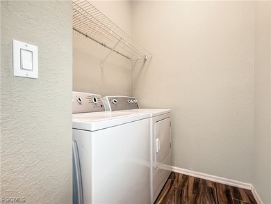 Welcome to Cypress Cay at Gateway! This well-maintained on Gateway Golf and Country Club in Florida - for sale on GolfHomes.com, golf home, golf lot