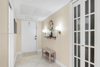 Welcome to Residence 202 at Oaks Lane. You'll feel lighter than on Palm-Aire Country Club and Resort - Palms in Florida - for sale on GolfHomes.com, golf home, golf lot