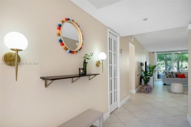 Welcome to Residence 202 at Oaks Lane. You'll feel lighter than on Palm-Aire Country Club and Resort - Palms in Florida - for sale on GolfHomes.com, golf home, golf lot