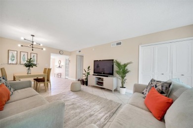 Welcome to Residence 202 at Oaks Lane. You'll feel lighter than on Palm-Aire Country Club and Resort - Palms in Florida - for sale on GolfHomes.com, golf home, golf lot