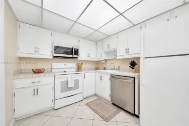 Welcome to Residence 202 at Oaks Lane. You'll feel lighter than on Palm-Aire Country Club and Resort - Palms in Florida - for sale on GolfHomes.com, golf home, golf lot