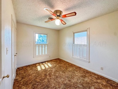 Welcome to your dream home at 1705 Takewell! This charming on Phillips Country Club in Texas - for sale on GolfHomes.com, golf home, golf lot
