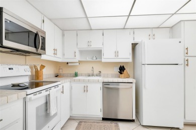 Welcome to Residence 202 at Oaks Lane. You'll feel lighter than on Palm-Aire Country Club and Resort - Palms in Florida - for sale on GolfHomes.com, golf home, golf lot