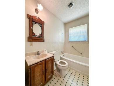 Welcome to your dream home at 1705 Takewell! This charming on Phillips Country Club in Texas - for sale on GolfHomes.com, golf home, golf lot