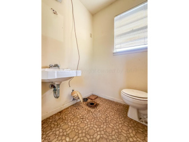 Welcome to your dream home at 1705 Takewell! This charming on Phillips Country Club in Texas - for sale on GolfHomes.com, golf home, golf lot