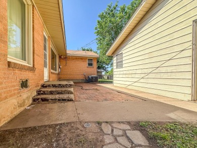 Welcome to your dream home at 1705 Takewell! This charming on Phillips Country Club in Texas - for sale on GolfHomes.com, golf home, golf lot