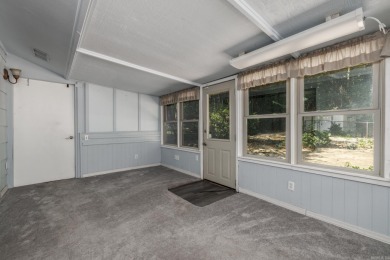 Don't miss this one!  Large living room with picture window and on Cortez Golf Course in Arkansas - for sale on GolfHomes.com, golf home, golf lot