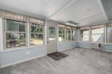 Don't miss this one!  Large living room with picture window and on Cortez Golf Course in Arkansas - for sale on GolfHomes.com, golf home, golf lot