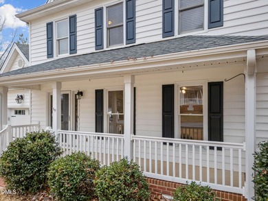 A rocking chair front porch welcomes you to your new home. Enter on Hedingham Golf and Athletic Club in North Carolina - for sale on GolfHomes.com, golf home, golf lot