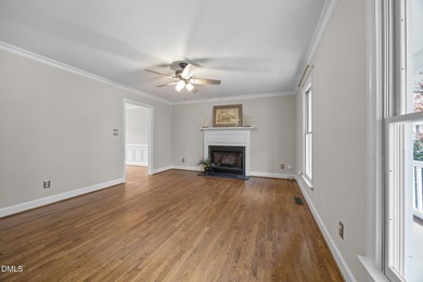 A rocking chair front porch welcomes you to your new home. Enter on Hedingham Golf and Athletic Club in North Carolina - for sale on GolfHomes.com, golf home, golf lot