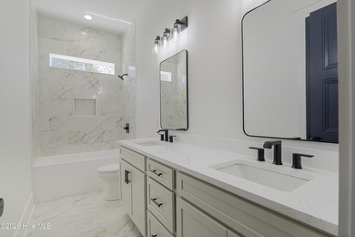 Exquisite Craftsman Home in Brunswick Plantation! Discover the on Brunswick Plantation and Golf Resorts in North Carolina - for sale on GolfHomes.com, golf home, golf lot