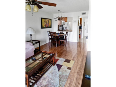 Enjoy stunning golf course and lake views from this bright on Sunrise Lakes Phase IV Golf Course in Florida - for sale on GolfHomes.com, golf home, golf lot