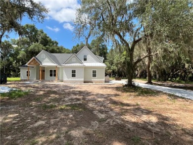 Stunning New Construction by Merit Homes in Sutherland Bluff on Sapelo Hammock Golf Club in Georgia - for sale on GolfHomes.com, golf home, golf lot