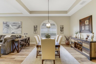 WARM, WELCOMING AND BEAUTIFULLY UPDATED THROUGHOUT! Meticulous on The Legacy Golf and Tennis Club in Florida - for sale on GolfHomes.com, golf home, golf lot