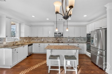 Located in the desirable Claybourn neighborhood, this 5 bedroom on Sterling Links Golf Club in Georgia - for sale on GolfHomes.com, golf home, golf lot