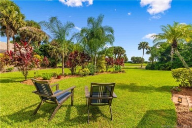 Welcome to this beautifully landscaped 4 bedroom, 2 bath home on St. Lucie Trail Golf Club in Florida - for sale on GolfHomes.com, golf home, golf lot