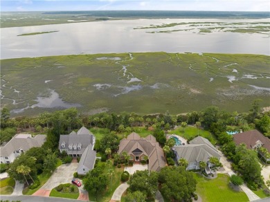 Nestled in the prestigious gated community of Oak Grove Island on Oak Grove Island Golf and Country Club in Georgia - for sale on GolfHomes.com, golf home, golf lot