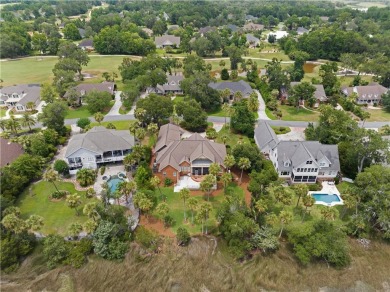 Nestled in the prestigious gated community of Oak Grove Island on Oak Grove Island Golf and Country Club in Georgia - for sale on GolfHomes.com, golf home, golf lot