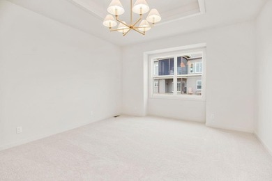 The Woodland by Elevate Design + Build is a reverse 1.5-story 5 on Heritage Park Golf Course in Kansas - for sale on GolfHomes.com, golf home, golf lot