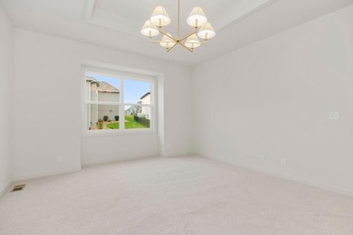 The Woodland by Elevate Design + Build is a reverse 1.5-story 5 on Heritage Park Golf Course in Kansas - for sale on GolfHomes.com, golf home, golf lot