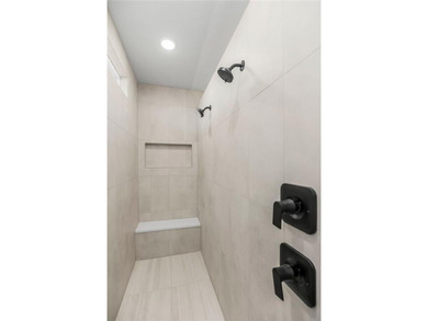 The Woodland by Elevate Design + Build is a reverse 1.5-story 5 on Heritage Park Golf Course in Kansas - for sale on GolfHomes.com, golf home, golf lot