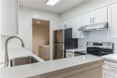 This street-level condo has been completely remodeled and is on Canyon Lakes Country Club in California - for sale on GolfHomes.com, golf home, golf lot