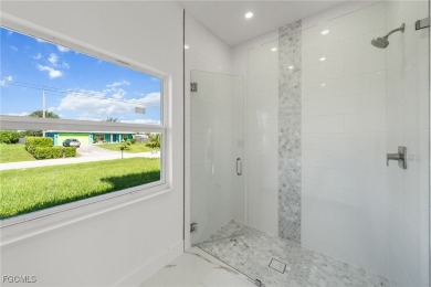 Stunning brand new modern home offering 3 bedrooms plus a on Del Tura Golf and Country Club in Florida - for sale on GolfHomes.com, golf home, golf lot