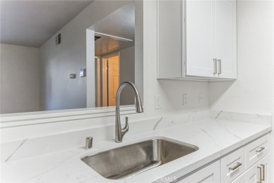 This street-level condo has been completely remodeled and is on Canyon Lakes Country Club in California - for sale on GolfHomes.com, golf home, golf lot