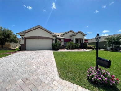 Welcome to this beautifully maintained Granville model located on Eagle Ridge At Spruce Creek Country Club in Florida - for sale on GolfHomes.com, golf home, golf lot