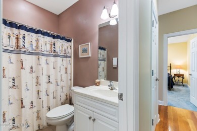 On Golden Pond: Where Southern Charm Meets Coastal Comfort
 on Carolina National Golf Club in North Carolina - for sale on GolfHomes.com, golf home, golf lot